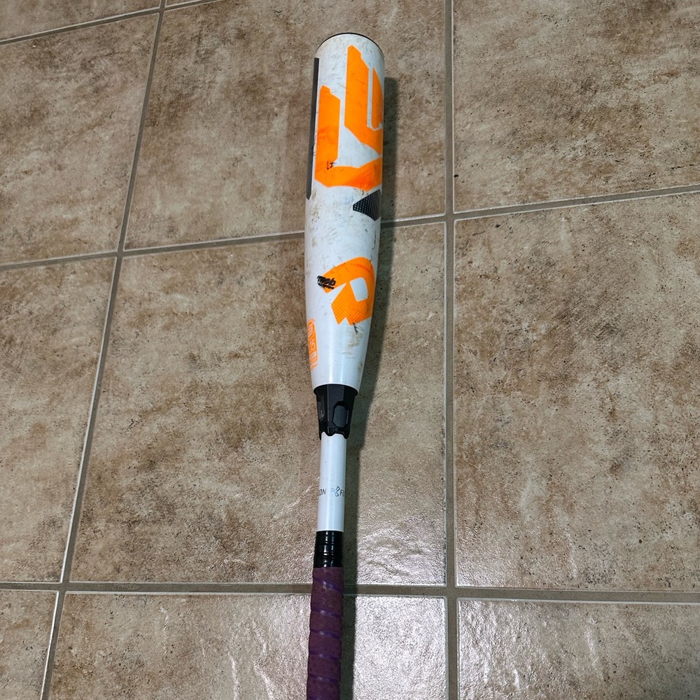 White and Orange Baseball Bat